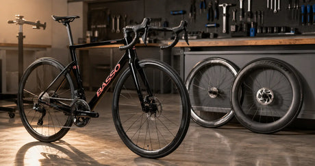 Basso Venta R road bike in a workshop with alloy and deep-section carbon wheelset options alongside
